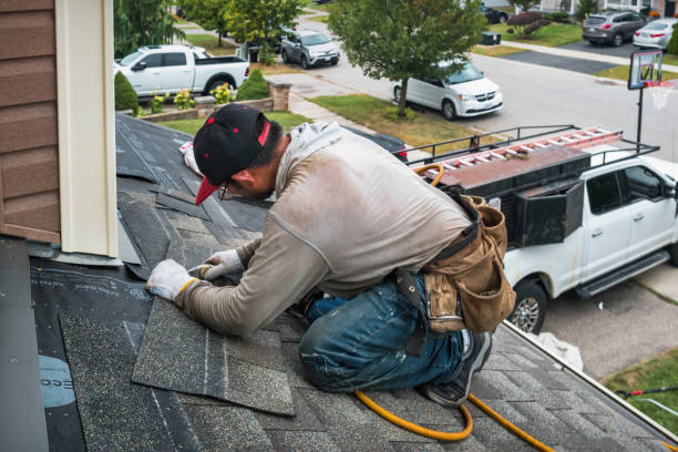 Professional Storm Damage Roof Repair technician working in Fairview, TX